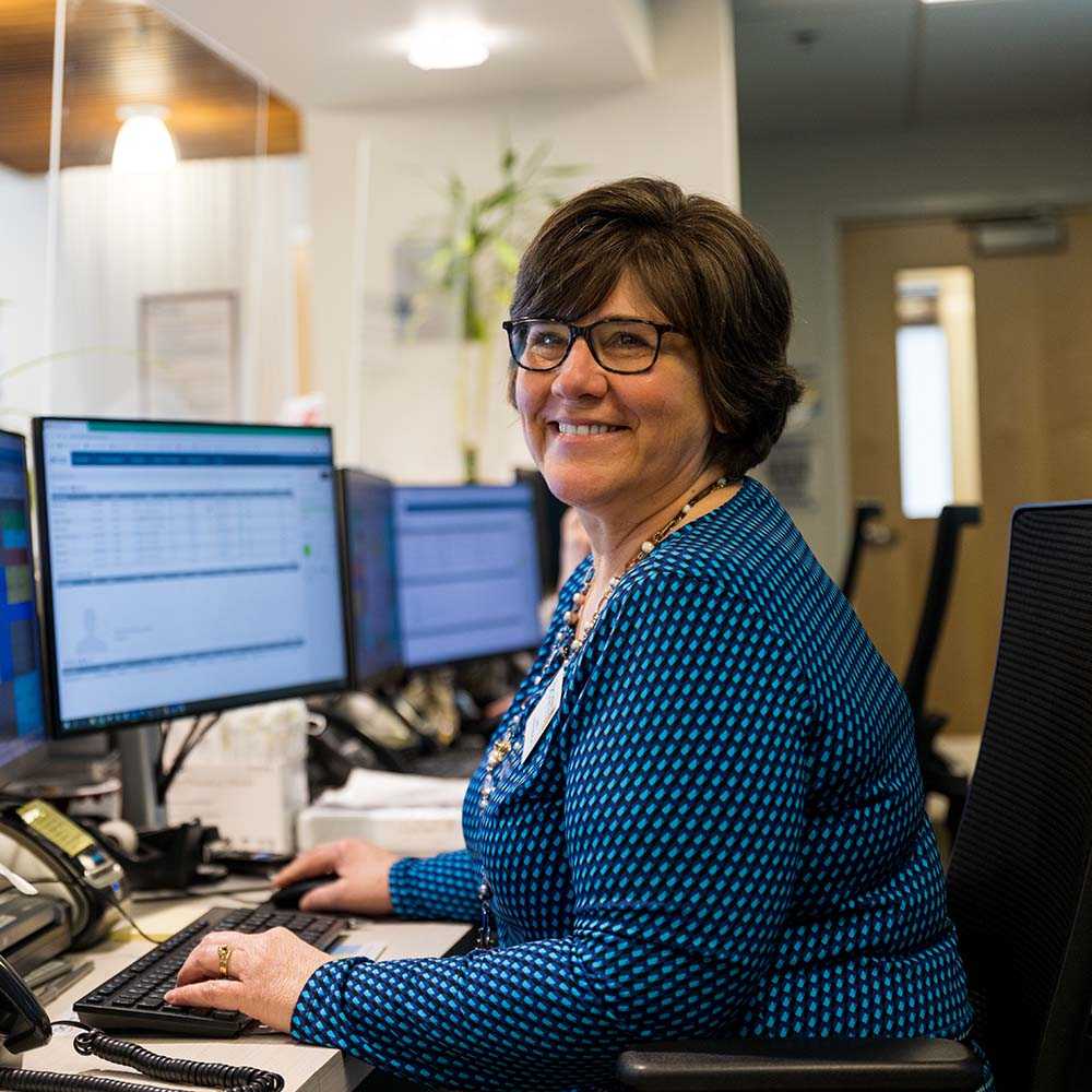 admin at her desk