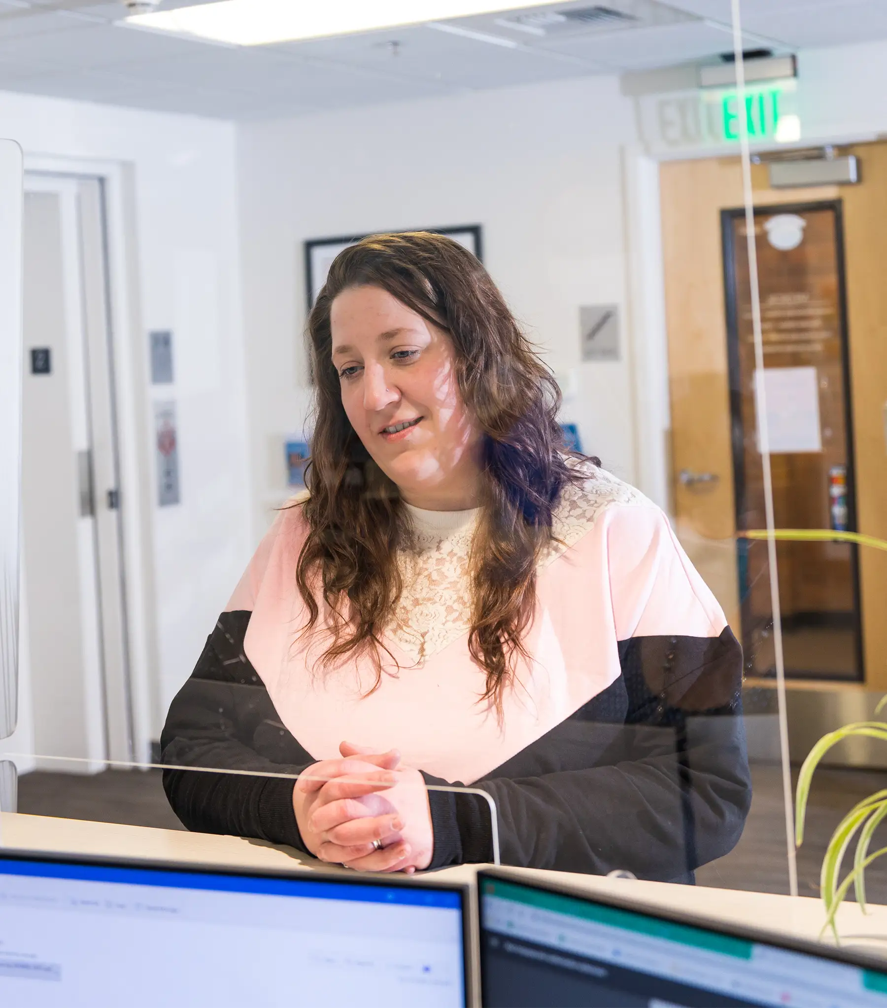 woman at front desk at CHC Sno